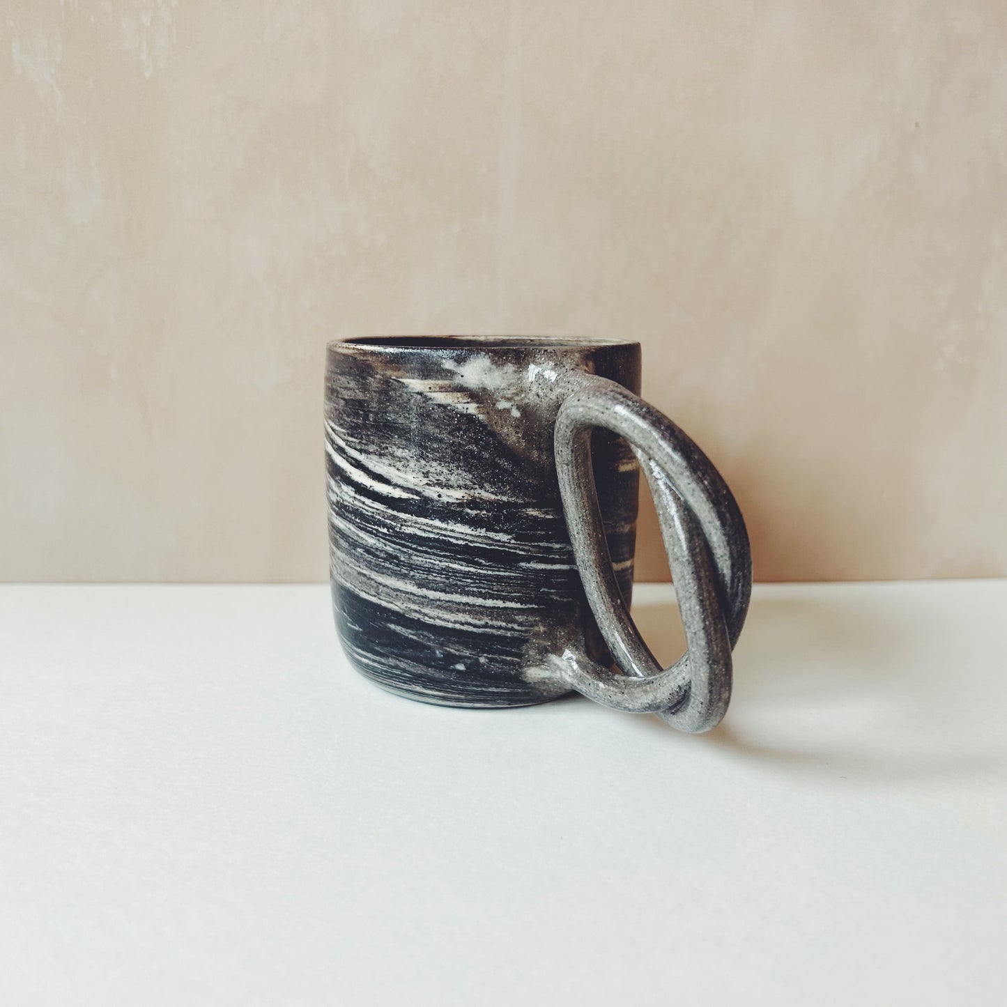 We Are Clay Handmade Marbled Ceramic Pretzel Cup - Black & White