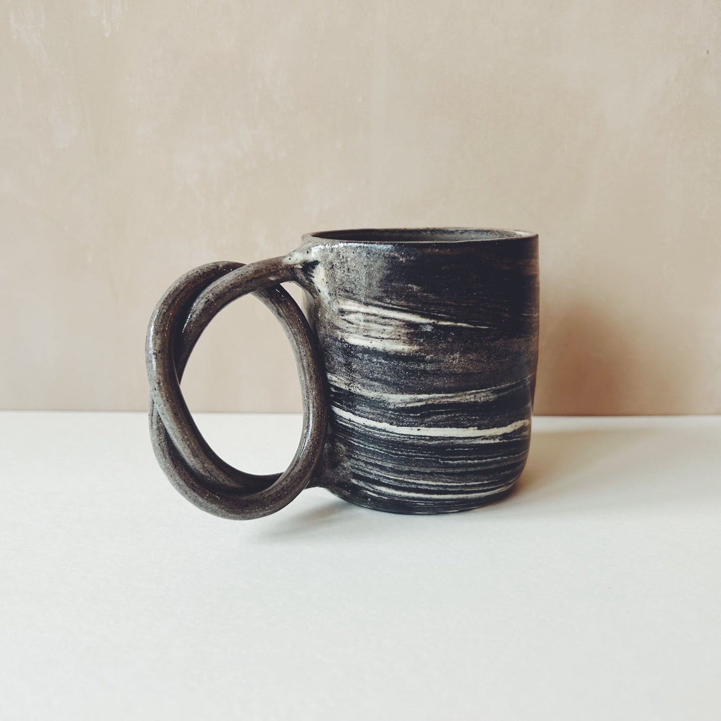 We Are Clay Handmade Marbled Ceramic Pretzel Cup - Black & White